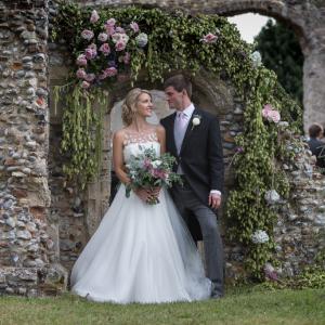 Medaeival archway with the bride and groom